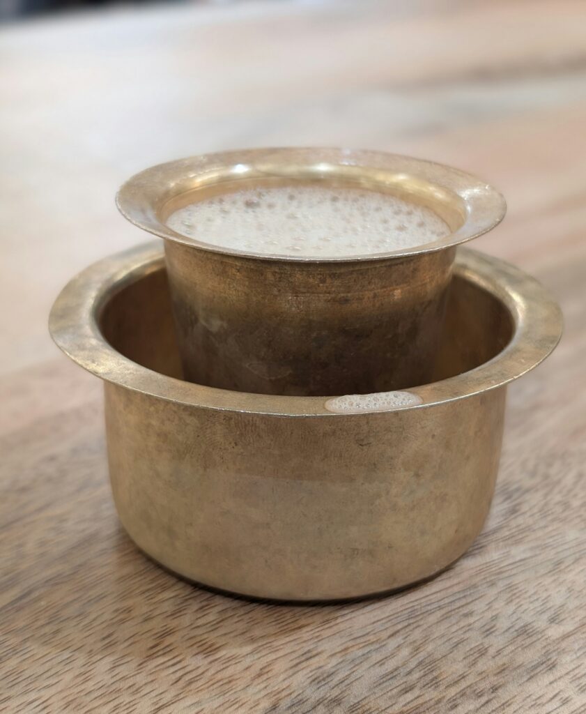 A Coffee brew from South Indian Coffee Filter in kept in the glass